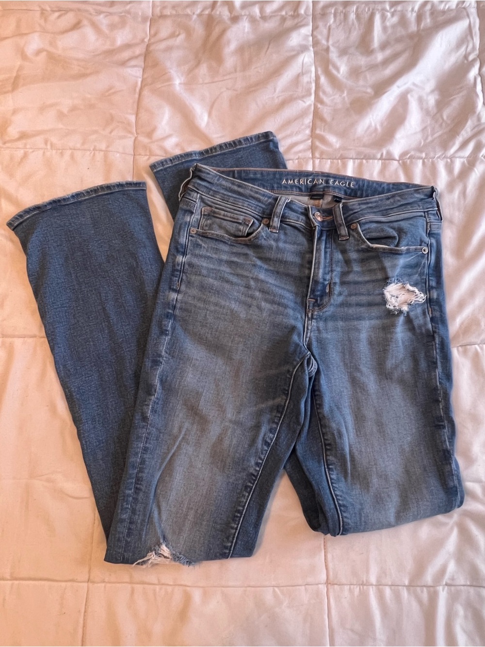 American Eagle Outfitters Women's Blue Flare Jeans with Distressed Detail